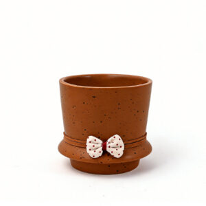 dolomite flower pot with christmas deco